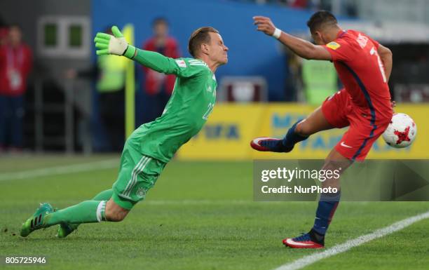 Marc-Andre Ter Stegen of the Germany national football team and Alexis Sanchez of the Chile national football team vie for the ball during the 2017...