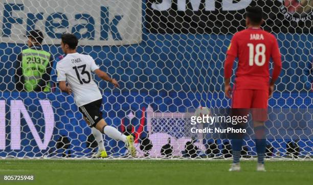 Lars Stindl of the Germany national football team and Gonzalo Jara of the Chile national football team vie for the ball during the 2017 FIFA...