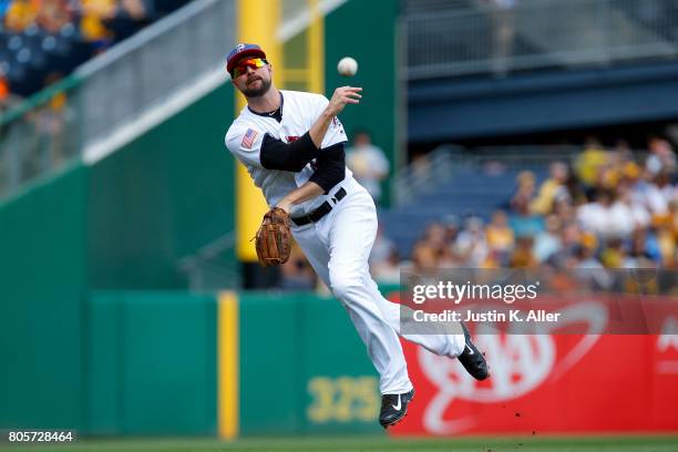 Jordy Mercer of the Pittsburgh Pirates fields a ground ball in the third inning against the San Francisco Giants at PNC Park on July 2, 2017 in...