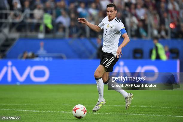 Germany's midfielder Julian Draxler plays the ball during the 2017 Confederations Cup final football match between Chile and Germany at the Saint...