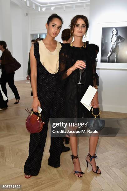 Iman Perez and Loulou Robert attend Guy Bourdin inaugural exhibition and unveiling of Maison Chloe as part of Paris Fashion Week at Maison Chloe on...