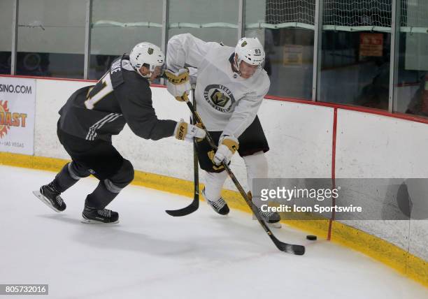 Reid Duke and Darian Romanko go for the puck during the Vegas Golden Knights Development Camp at the Las Vegas Ice Center on July 01, 2017 in Las...
