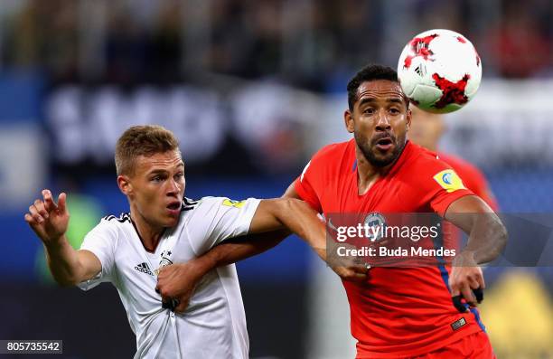 Joshua Kimmich of Germany and Jean Beausejour of Chile battle for possession during the FIFA Confederations Cup Russia 2017 Final between Chile and...