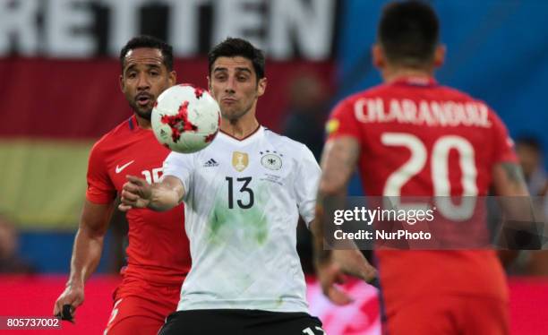 Jean Beausejour of the Chile national football team and Lars Stindl of the Germanyl national football team vie for the ball during the 2017 FIFA...