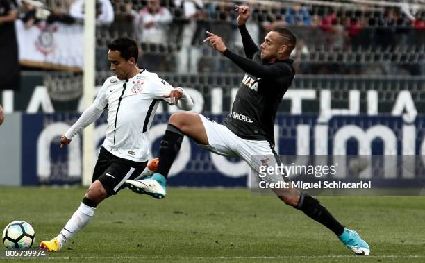 Jadson of Corinthians vies for the ball with of Botafogo during the match between Corinthians and Botafogo for the Brasileirao Series A 2017 at Arena...