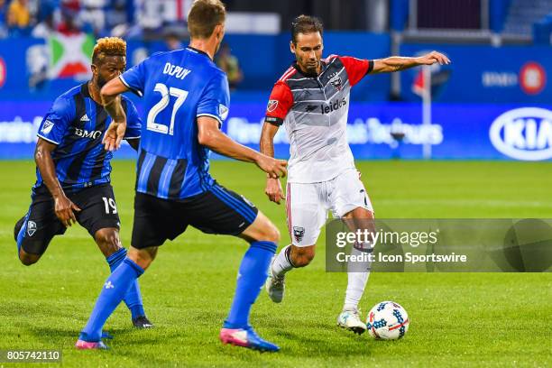 United midfielder Marcelo Sarvas running in control of the ball facing Montreal Impact forward Nick DePuy during the DC United versus the Montreal...