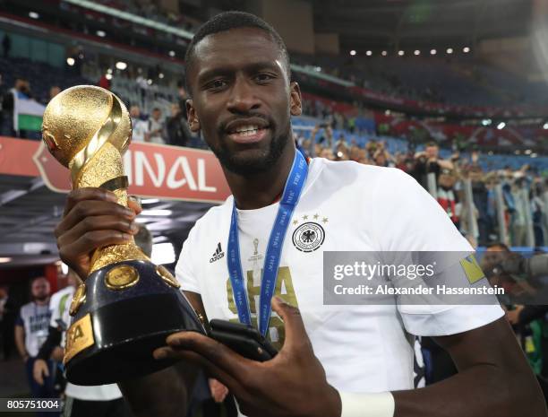 Antonio Ruediger of Germany poses with the trophy after the FIFA Confederations Cup Russia 2017 Final between Chile and Germany at Saint Petersburg...