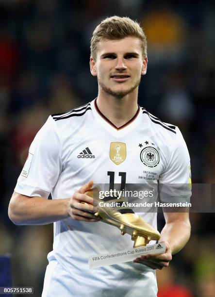 Timo Werner of Germany poses with the golden boot award after the FIFA Confederations Cup Russia 2017 Final between Chile and Germany at Saint...