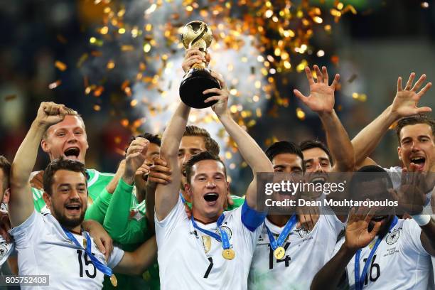 Julian Draxler of Germany celebrates with the FIFA Confederations Cup trophy after the FIFA Confederations Cup Russia 2017 Final between Chile and...
