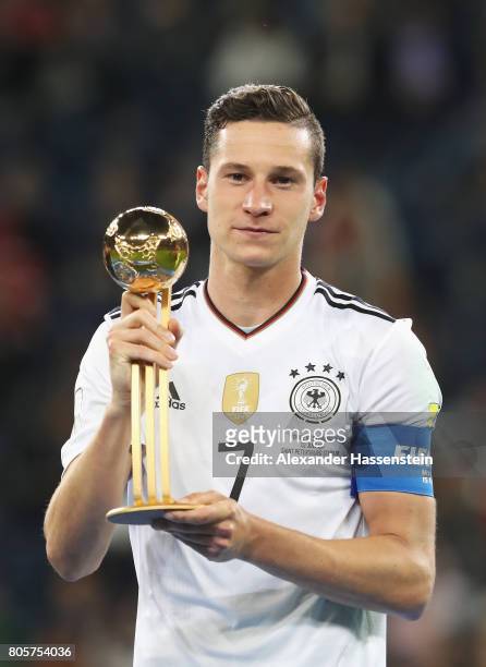 Julian Draxler of Germany poses with the golden ball award after the FIFA Confederations Cup Russia 2017 Final between Chile and Germany at Saint...