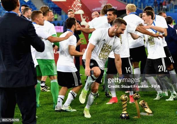 Shkodran Mustafi of Germany celebrates with the FIFA Confederations Cup trophy after the FIFA Confederations Cup Russia 2017 Final between Chile and...