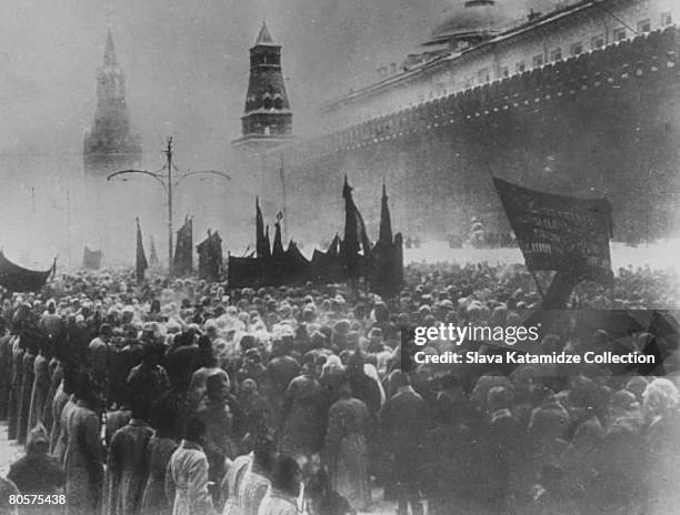 Crowds gather outside the Kremlin in Moscow's Red Square, to see Vladimir Lenin's embalmed body placed in a specially-constructed mausoleum, 27th...