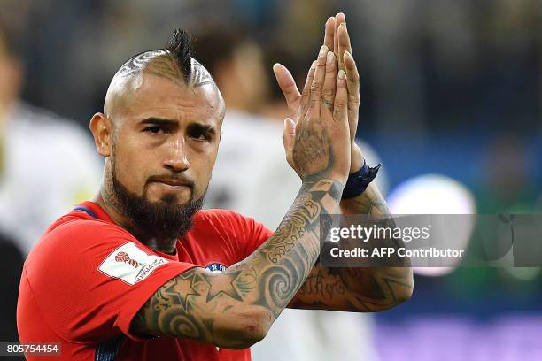 Chile's midfielder Arturo Vidal applauds after the 2017 Confederations Cup final football match between Chile and Germany at the Saint Petersburg...