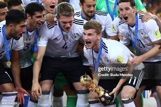 Timo Werner of Germany lifts the FIFA Confederations Cup trophy after the FIFA Confederations Cup Russia 2017 Final between Chile and Germany at...