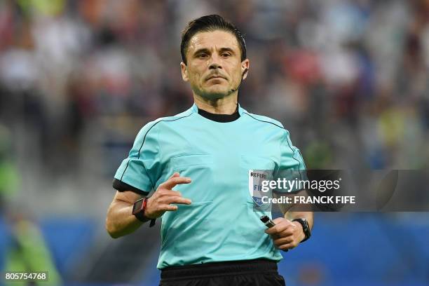 Serbian referee Milorad Mazic officiates the 2017 Confederations Cup final football match between Chile and Germany at the Saint Petersburg Stadium...
