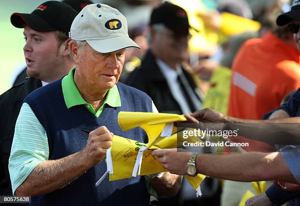 Jack Nicklaus signs autographs for fans during the third day of practice prior to the start of the 2008 Masters Tournament at Augusta National Golf...