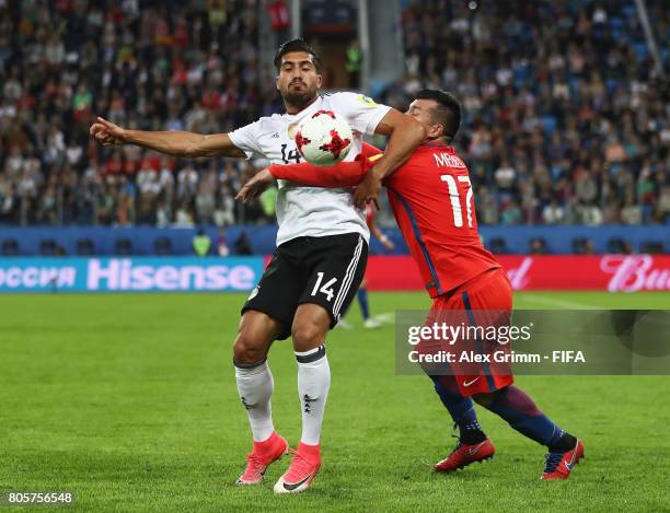 Emre Can of Germany and Gary Medel of Chile battle for possession during the FIFA Confederations Cup Russia 2017 Final between Chile and Germany at...