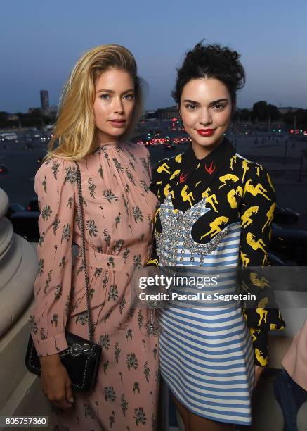 Doutzen Kroes and Kendall Jenner attends Miu Miu Cruise Collection show as part of Haute Couture Paris Fashion Week on July 2, 2017 in Paris, France.