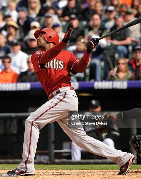 Chris Young of the Arizona Diamondbacks watches the flight of his pop fly during the MLB game against the Colorado Rockies at Coors Field on April 6,...