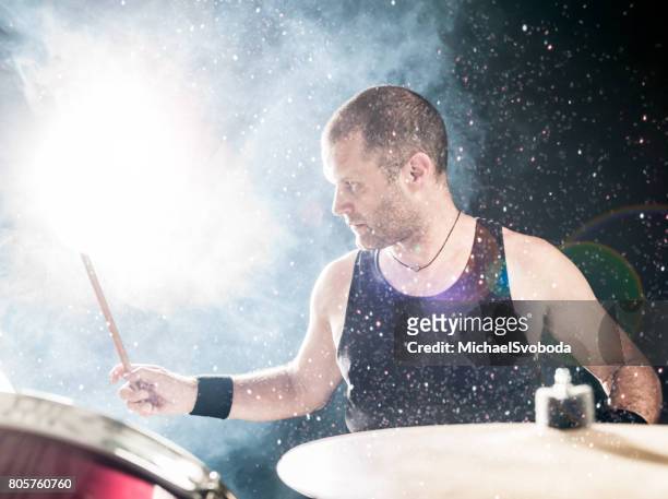 rock n roll drummer - hitting drum stock pictures, royalty-free photos & images