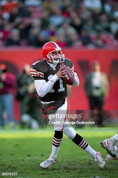 Quarterback Ty Detmer of the Cleveland Browns drops back to pass against the Jacksonville Jaguars at Cleveland Browns Stadium on December 19, 1999 in...