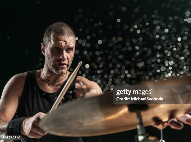 rock n roll drummer - hitting drum stock pictures, royalty-free photos & images