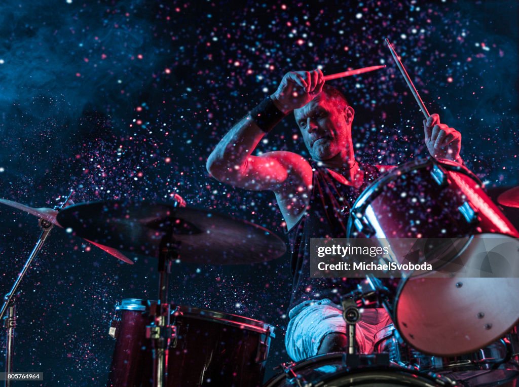 Rock N Roll Drummer Sparkles In The Air