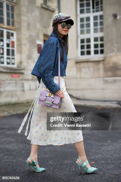 Leaf Greener poses wearing Miu Miu before the Rodarte show at the Cloitre Port Royal during Paris Fashion Week Haute Couture FW17/18 on July 2, 2017...