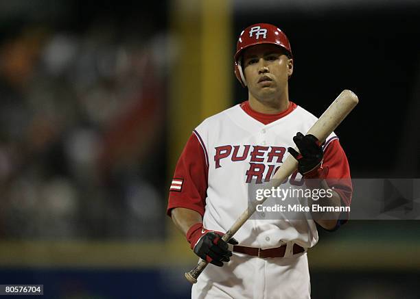 Carlos Beltran of team Puerto Rico bats during a 2nd round game against team Cuba during the 2006 World Baseball Classic at Hiram Bithorn Stadium in...