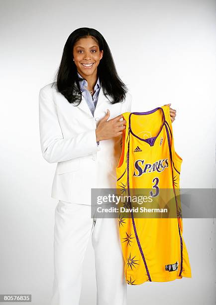 Number 1 overall pick by the Los Angeles Sparks Candace Parker from the University of Tennessee poses for a portrait with her new jersey during the...