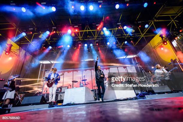 Sarah Neufeld, Richard Reed Parry, Win Butler and Tim Kingsbury of Arcade Fire perform live on stage during a concert at Kindl Buehne Wuhlheide on...