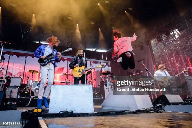 Richard Reed Parry, Win Butler, Will Butler and Tim Kingsbury of Arcade Fire perform live on stage during a concert at Kindl Buehne Wuhlheide on July...