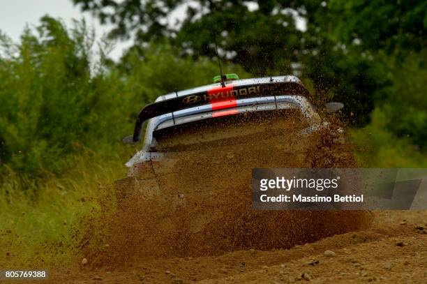 Hayden Paddon of New Zealand and Sebastian Marshall of Great Britain compete with their Hyundai Motorsport WRT Hyundai i20 WRC during Day Three of...