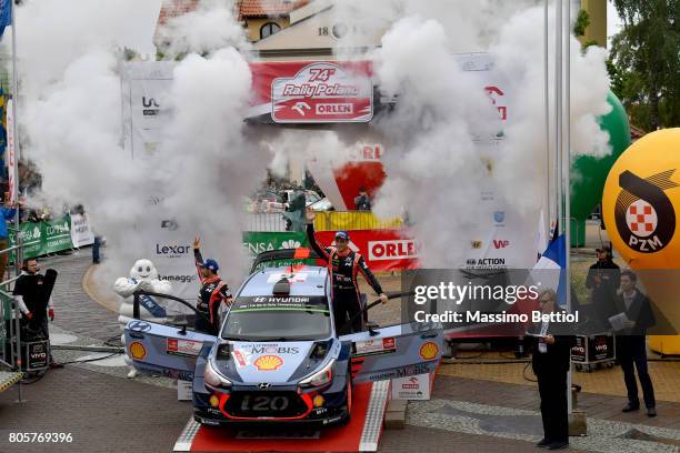 Thierry Neuville of Belgium and Nicolas Gilsoul of Belgium celebrate their victory during Day Three of the WRC Poland on July 2, 2017 in Mikolajki,...