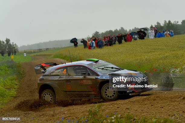 Hayden Paddon of New Zealand and Sebastian Marshall of Great Britain compete with their Hyundai Motorsport WRT Hyundai i20 WRC during Day Three of...