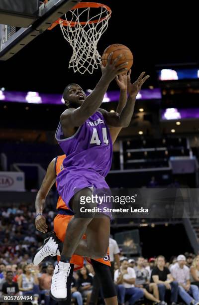 Ivan Johnson of the Ghost Ballers shoots a reverse layup during week two of the BIG3 three on three basketball league at Spectrum Center on July 2,...