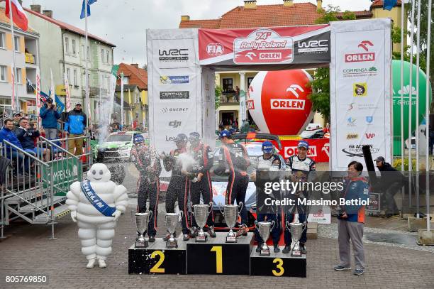 Hayden Paddon of New Zealand and Sebastian Marshall of Great Britain; Thierry Neuville of Belgium and Nicolas Gilsoul of Belgium; Sebastien Ogier of...