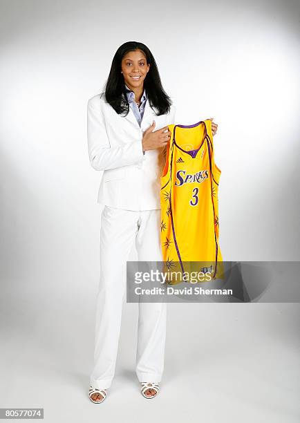 Number 1 overall pick by the Los Angeles Sparks Candace Parker from the University of Tennessee poses for a portrait with her new jersey during the...