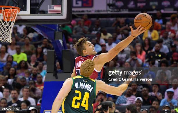 Lou Amundson of Tri-State battles Brian Scalabrine of Ball Hogs for a rebound during week two of the BIG3 three on three basketball league at...