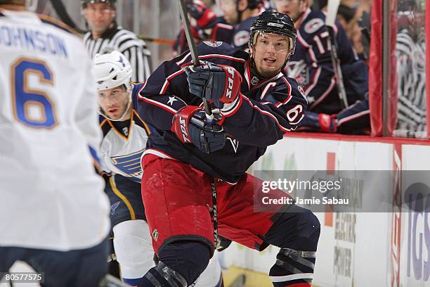 Rick Nash of the Columbus Blue Jackets shoots the puck up ice against the St. Louis Blues on April 6, 2008 at Nationwide Arena in Columbus, Ohio.