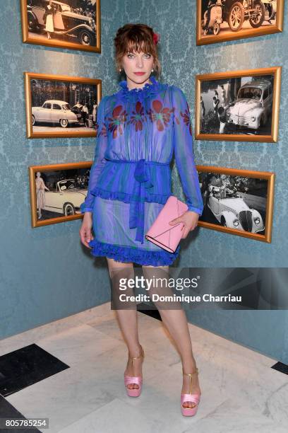 Milla Jovovich attends Miu Miu Cruise Collection show as part of Haute Couture Paris Fashion Week on July 2, 2017 in Paris, France.