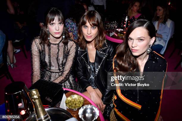 Stacy Martin, Alexa Chung and Anna Brewster attends Miu Miu Cruise Collection show as part of Haute Couture Paris Fashion Week on July 2, 2017 in...