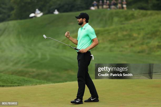 Kyle Stanley of the United States reacts after defeating Charles Howell III of the United States during a playoff in the final round of the Quicken...