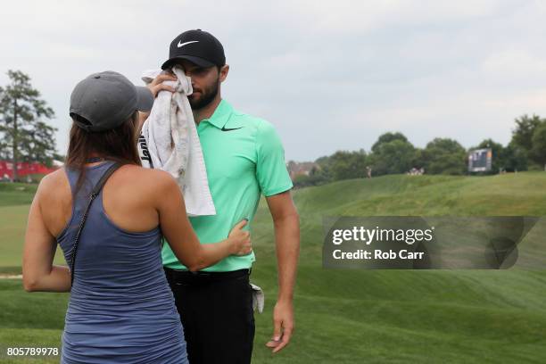 Kyle Stanley of the United States celebrates with his wife Dolly after defeating Charles Howell III of the United States during a playoff in the...