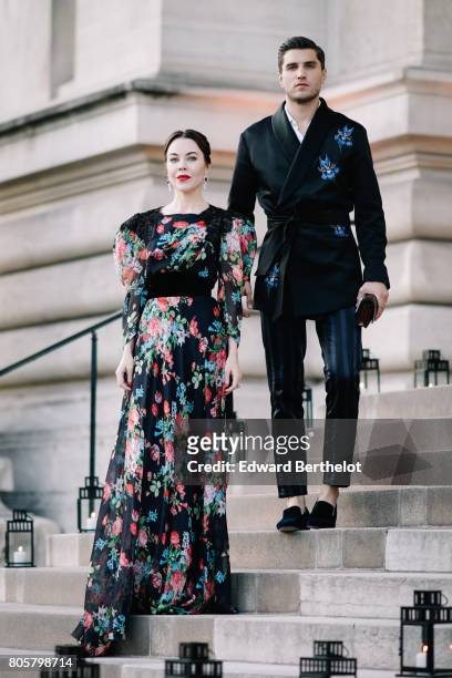 Ulyana Sergeenko and Frol Burimskiy attend the the amfAR Paris Dinner at Le Petit Palais, during Paris Fashion Week - Haute Couture Fall/Winter...