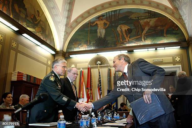 Army Chief of Staff Gen. George Casey greets House Appropriations Subcommittee on Military Construction, Veterans Affairs, and Related Agencies...