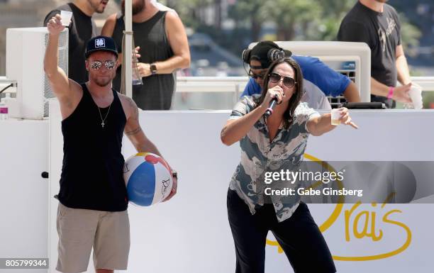 Singers Brian Littrell and Kevin Richardson of the Backstreet Boys toast during a Fourth of July weekend celebration at Drai's Beach Club - Nightclub...