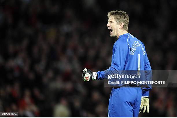 Manchester United's Dutch goalkeeper Edwin van der Sar reacts after saving a penalty against AS Roma during the second leg of their UEFA Champions...