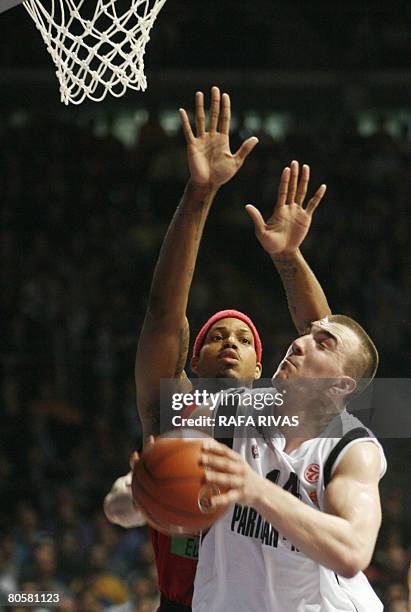 Baskonia's Will McDonald vies with Partizan Igokea's Nikola Pekovic during their Play Off, third leg, Euroleague Basket match at the Fernando Buesa...