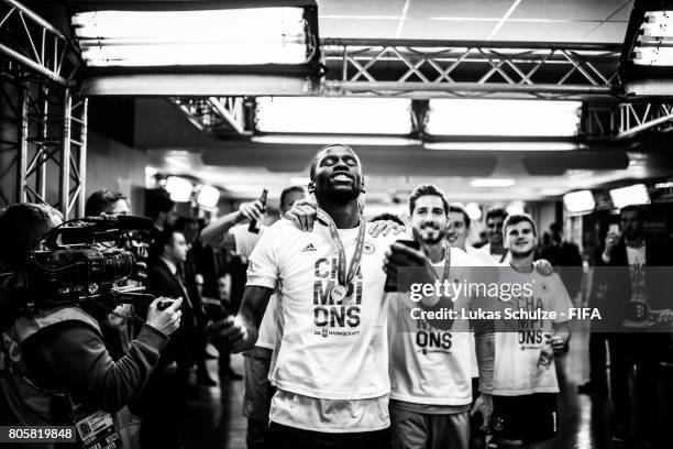 Antonio Ruediger of Germany and team mates celebrate in the players tunnel after winning the FIFA Confederations Cup final match between Chile and...